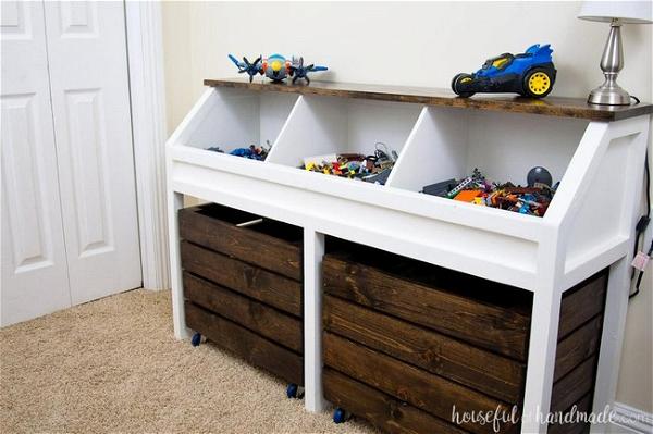 Build Something’s Toy Storage Console With Rolling Bins