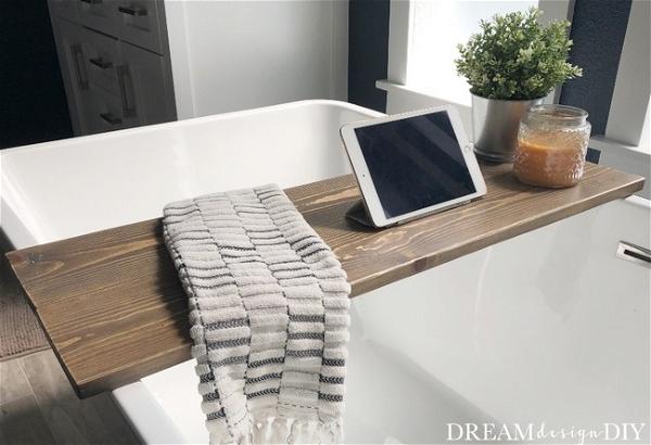 Super Simple DIY Bathtub Tray Perfect For Holding Your Bath Time Essentials