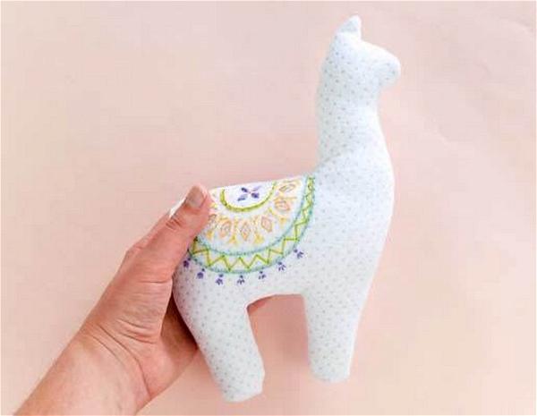Alpaca With Embroidered Saddle