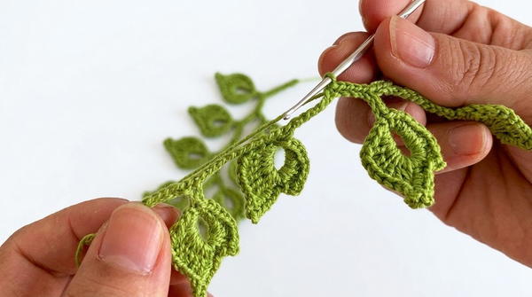 Make a beautiful Irish crochet branch for your blouses. 6